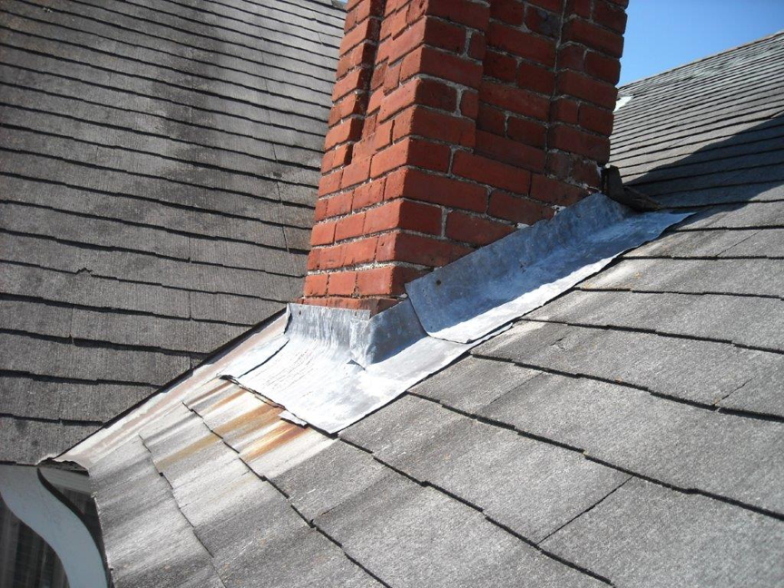 South side Chimney flashing and roof before restoration