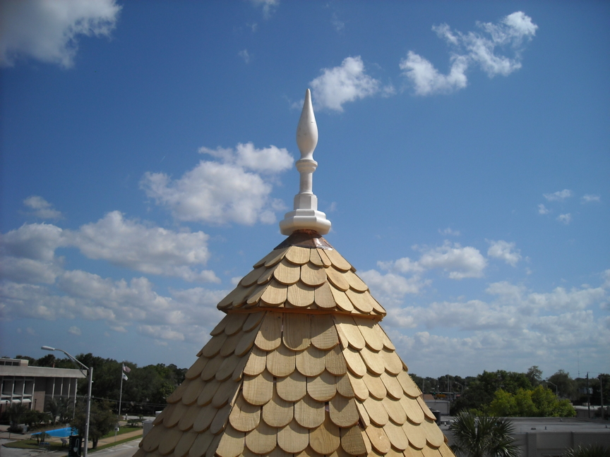 Turret with new shingles and finial installed.